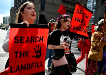 Cambria Harris, daughter of Morgan Harris, centre, and Jorden Myran, sister of Marcedes Myran, march towards Parliament Hill on an International Day of Action to Search the Landfills, in Ottawa, on Monday, Sept. 18, 2023. The remains of Morgan Harris, Marcedes Myran and another woman named as Mashkode Bizhiki’ikwe, or Buffalo Woman, killed by an alleged serial killer, are believed to be in a landfill north of Winnipeg. THE CANADIAN PRESS/Justin Tang