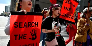Cambria Harris, daughter of Morgan Harris, centre, and Jorden Myran, sister of Marcedes Myran, march towards Parliament Hill on an International Day of Action to Search the Landfills, in Ottawa, on Monday, Sept. 18, 2023. The remains of Morgan Harris, Marcedes Myran and another woman named as Mashkode Bizhiki’ikwe, or Buffalo Woman, killed by an alleged serial killer, are believed to be in a landfill north of Winnipeg. THE CANADIAN PRESS/Justin Tang