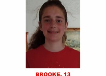 Photo of missing girl Brooke, 13, from Elliot Lake wearing a red shirt and shoulder length brown hair
