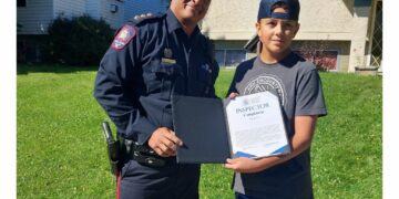 Photo of Calgary youth Ryder recognized by police for helping in a missing child incident