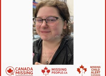 Photo of missing youth Mia “Sage,” age 13, from Flesherton, Ontario, with dyed black wavy hair, glasses, and nose piercing.