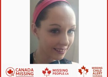 Photo of missing woman Robin-Lynn, 36, from Timmins, Ontario, with long brown hair and blue eyes.