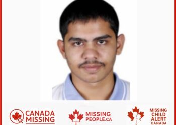 Photo of missing man Aman, 21, from Whitby, Ontario, with black hair, dark eyes, and a mole on the left side of his lips.