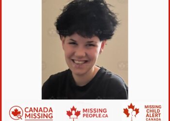 OPP handout photo of missing boy Levi Degrandpre, 15, from Ottawa, smiling with short curly black hair.