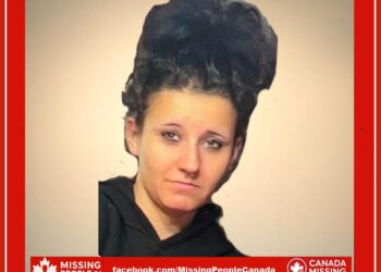 Photo of missing 15-year-old girl Elise, Caucasian, black curly hair, wearing dark clothing, from Timmins, Ontario.