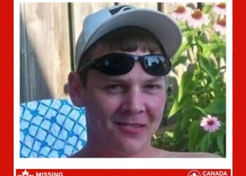 Photo of missing man Trever Andrews, 26 at disappearance (born 1983), short light-brown hair, green eyes, red birthmark on left cheek, last seen London 2009.