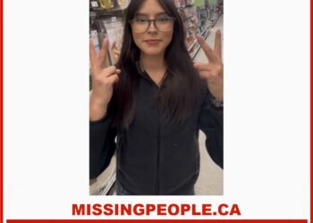 Photo of missing teen Zada Gordon, age 14, from Parkland County, Alberta, wearing glasses and a tiara in a store aisle.