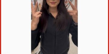 Photo of missing teen Zada Gordon, age 14, from Parkland County, Alberta, wearing glasses and a tiara in a store aisle.