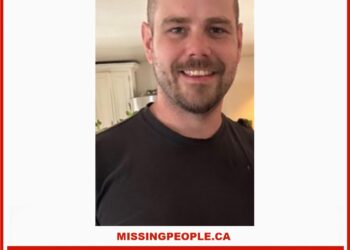 Photo of missing man Daniel Howes, age 37, short dark hair and beard, smiling, from Prince Edward County, Ontario.