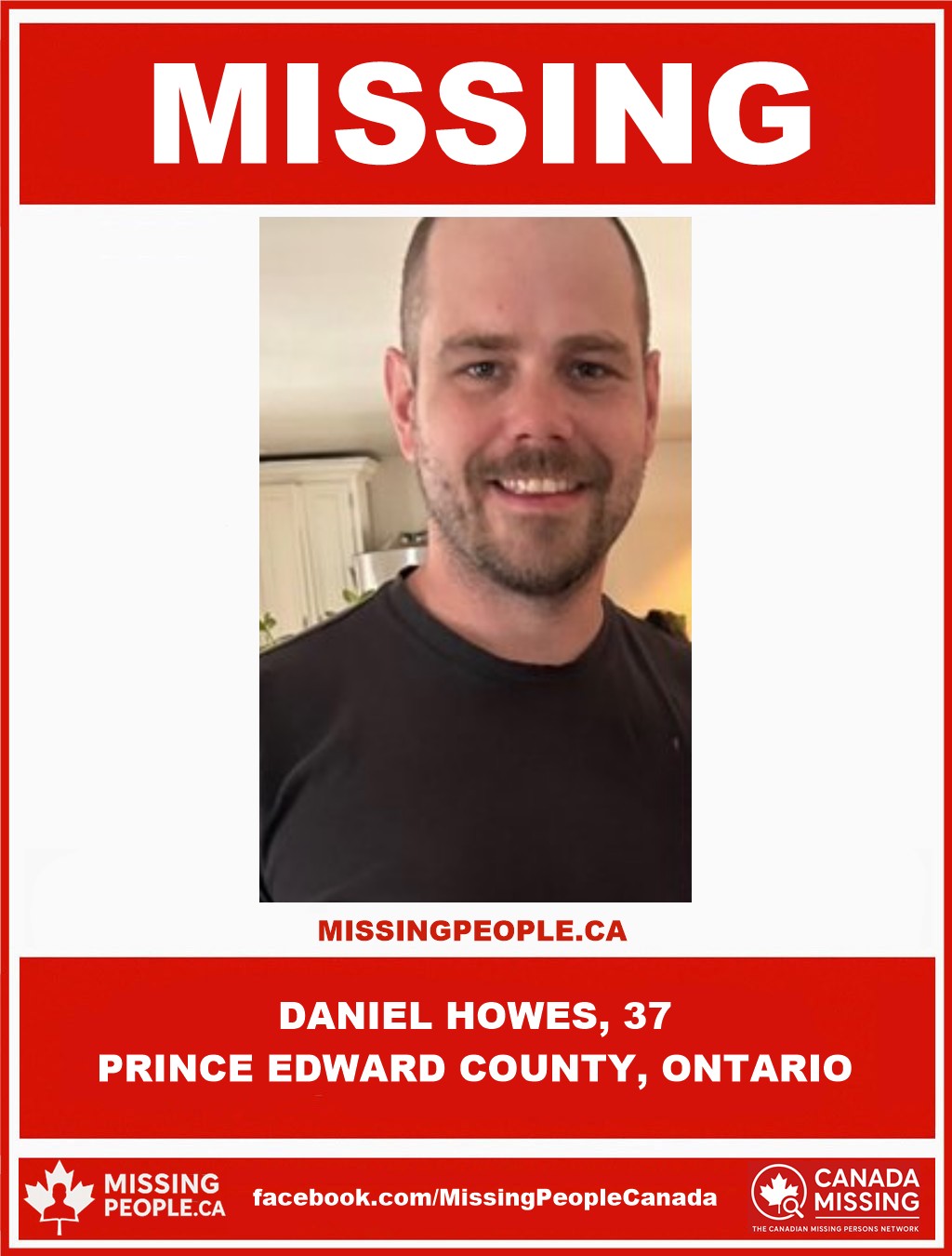 Photo of missing man Daniel Howes, age 37, short dark hair and beard, smiling, from Prince Edward County, Ontario.