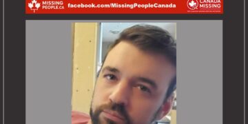 Photo of missing man Justin Deforge, age 41, from Manitowaning, Ontario (man with short brown hair, brown goatee, smiling, wearing red shirt).